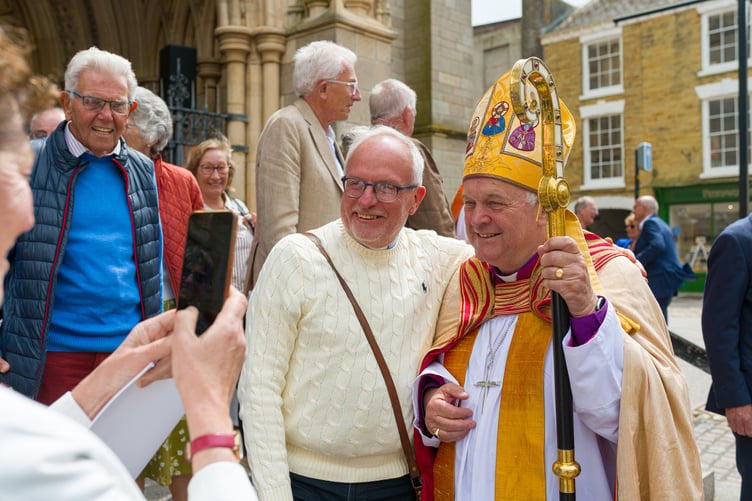 Selfies with the crowd - Bishop David Williams after his installation at Truro Cathedral