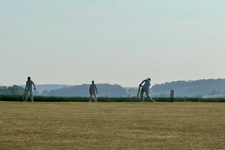 Petersfield batter James Longland plays a flowing drive
