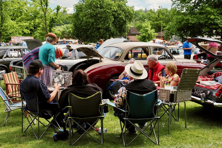 Families enjoy live jazz, local food stalls and vintage shopping alongside the cars at the Haslemere show.