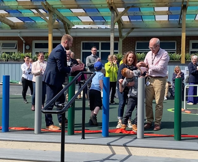 Red ribbon day as £475k school playground officially opened