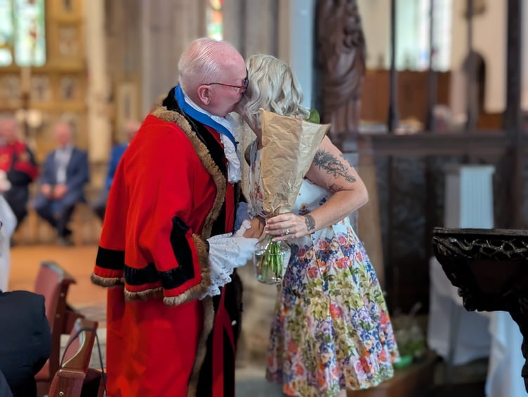 Cllr Mike Barbery, the deputy mayor of Bodmin presents his daughter, his consort for the year ahead with a bouquet of flowers. (Picture: Aaron Greenaway/Tindle)