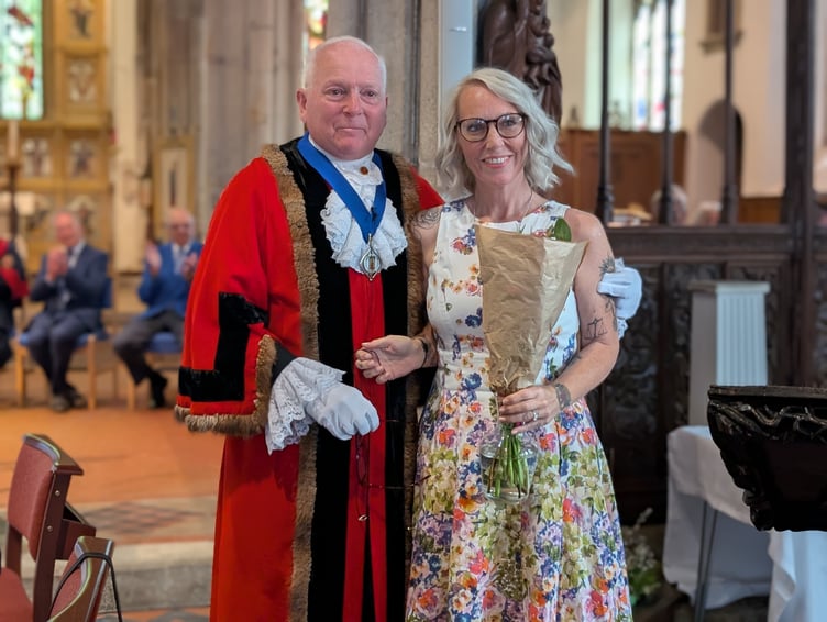 Cllr Mike Barbery, the deputy mayor of Bodmin presents his daughter, his consort for the year ahead with a bouquet of flowers. (Picture: Aaron Greenaway/Tindle)