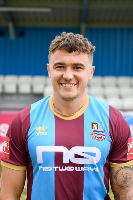 Farnham Town have signed Tom Leggett