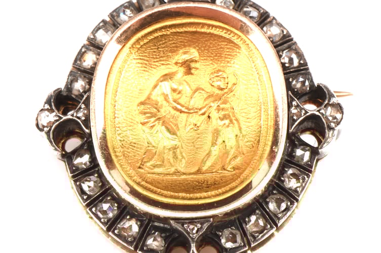Early Boucheron brooch, centrally set with a gold intaglio depicting Venus and cupid