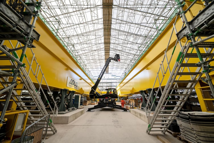 Critical pieces of equipment are being installed inside Unit 1’s turbine hall.
