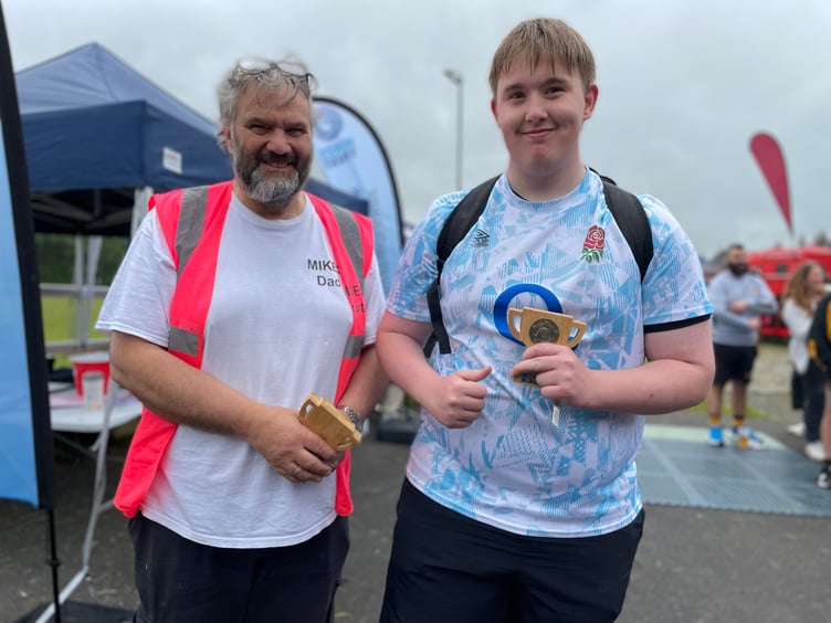 Kevin Allen pictured with the winners of the categories in the rugby tournament. (Picture: Aaron Greenaway/Tindle)