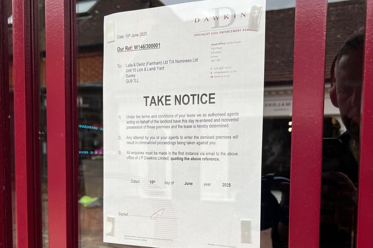 Notice on the door of The Luxe in Lion and Lamb Yard, Farnham.