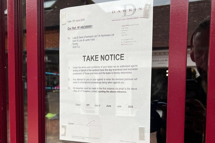 Notice on the door of The Luxe in Lion and Lamb Yard, Farnham.