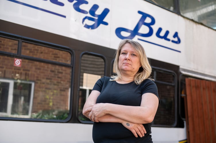Wendy Salmon, who is being forced to move her bus from her front garden. Frimley, 13th June 2025 A woman has been slapped with an ASBO and forced to remove a bus being renovated in her drive - after complaints from 'snobby' neighbours it was 'ruining the ambience.' Wendy Salmon parked the vehicle on the drive at the end of a cul-de-sac in a posh Surrey street as she wanted to turn it into a cafe business. But she accused one neighbour of 'rallying' the street against her by complaining. And despite the council accepting she was 'not breaking any laws' she has been hit with a CPN and ordered to remove it by 20 June following a bitter two year legal battle.