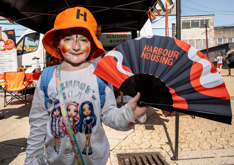 A lucky chicken poo bingo winner with her prizes from Harbour Housing. (Picture: Paul Williams)