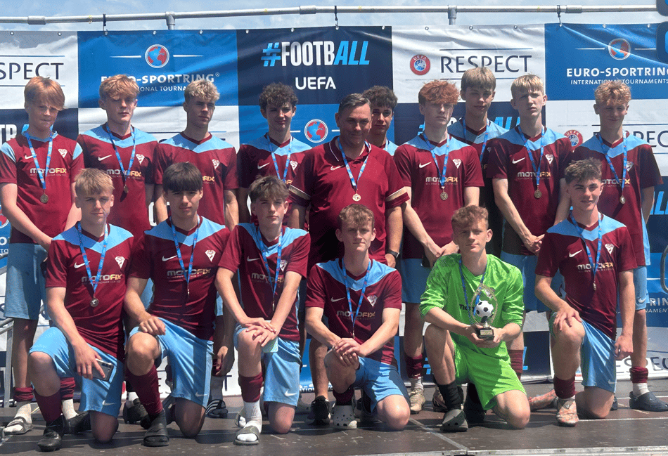 <p>Wey Valley FC receive their medals and a trophy (Photo: Wey Valley FC).</p>