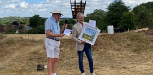High praise as benefactor gifts hill to village