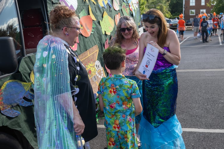 This mermaid was a delighted winner.