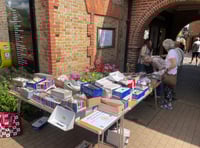 WATCH: Mayor shows he's got sole with charity shoe sale