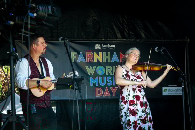 Choro Bandido play at the Farnham Carnival event in Gostrey Meadow.
