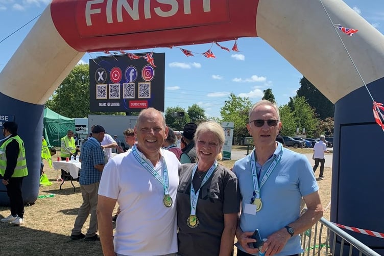 The Mayor and Mayoress of Farnham and Trustee Simon Porter.