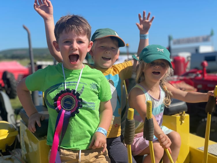 These youngsters are all smiles as they enjoyed a fun-filled day out at the 120th Liskeard Show held at Merrymeet on Saturday