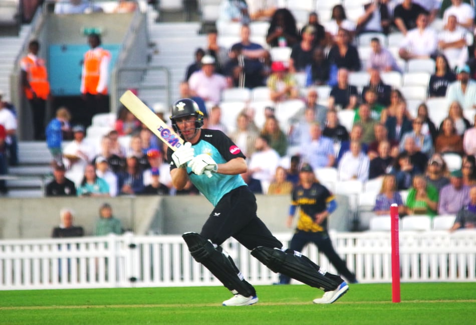 <p>Dan Lawrence batting for Surrey in T20 action (Photo: Mark Sandom)</p>