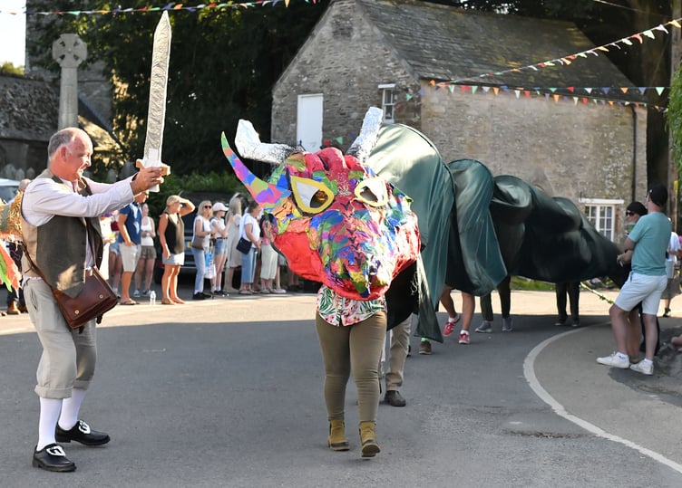Members of the St Tudy Historical Society with "The Battle with the Fiery Dragon of Bodmin Moor" (Picture: Adrian Jasper)