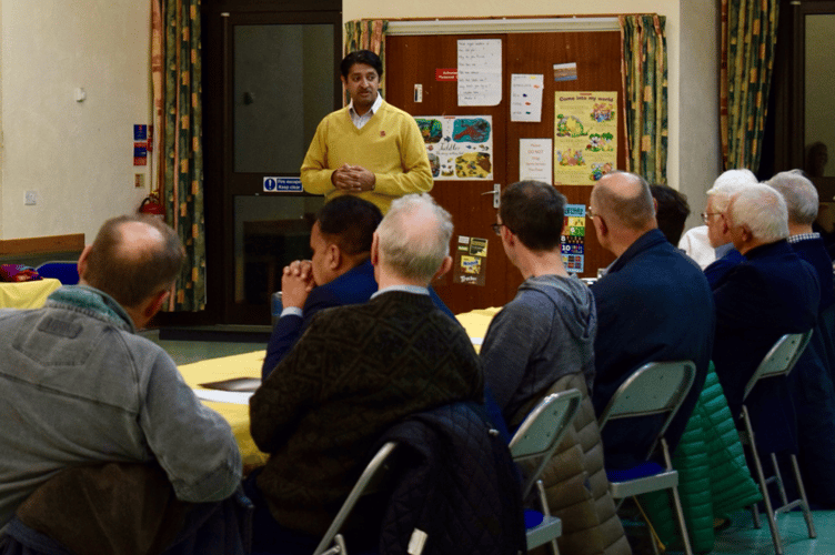 Khalil Yousuf addresses a meeting about SEND services.