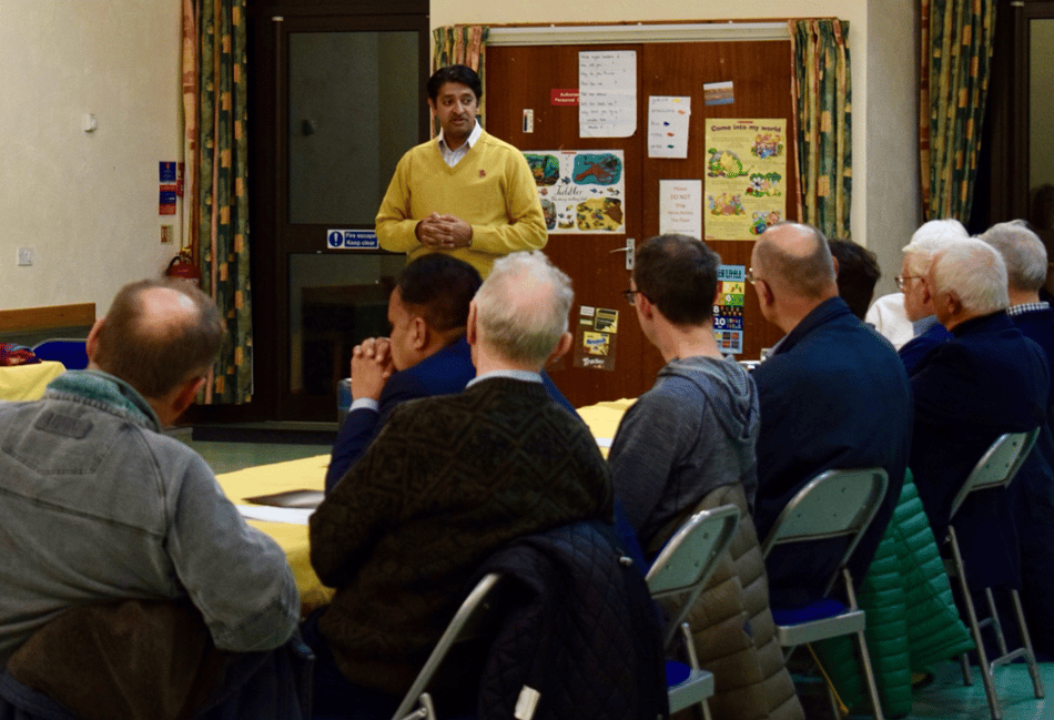 <p>Khalil Yousuf addresses a meeting about SEND services.</p>