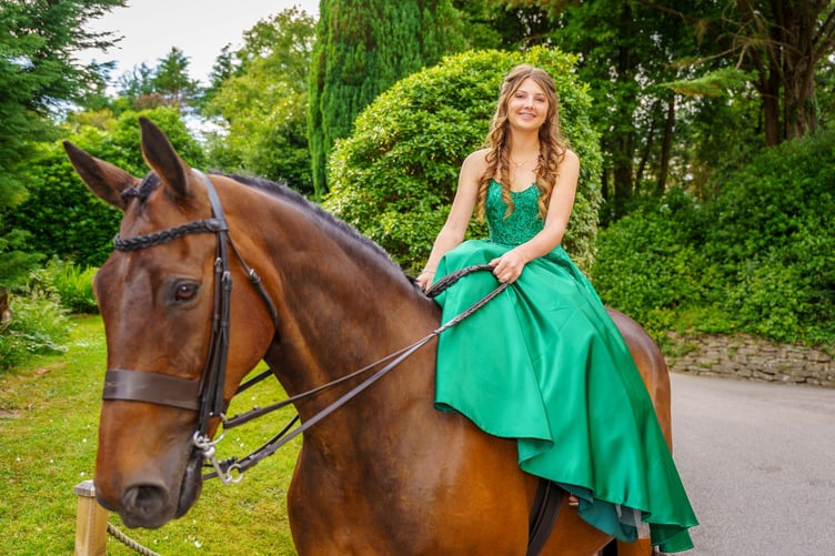 Alanna Jones arrives at the Roseland Academy Prom on horseback