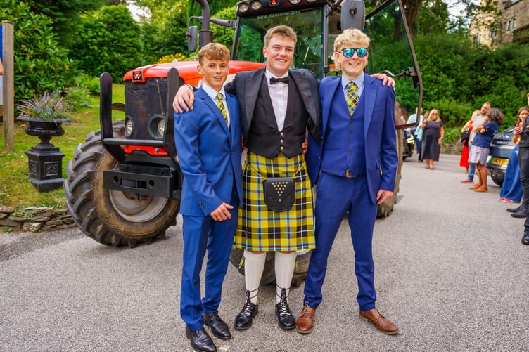 Ed Ives, Joe Hewett and William Michell attend the Roseland Academy Prom 2025