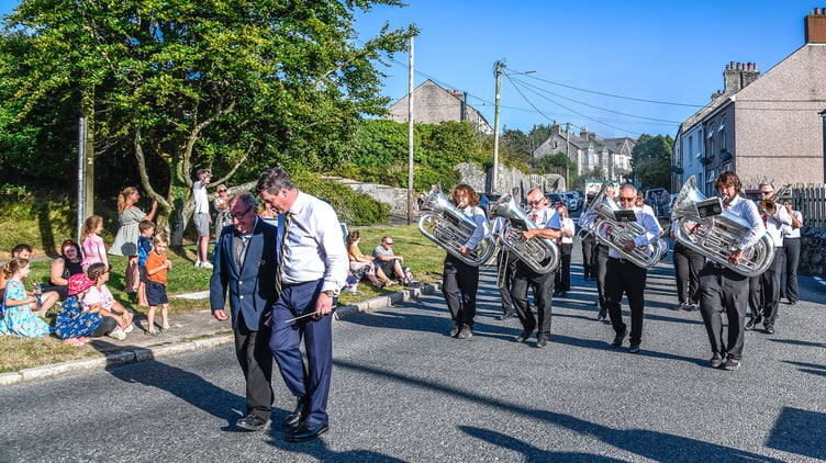 Derek Savage leads the St Dennis Band at the head of the carnival parade. (Picture: Derek R Williams)