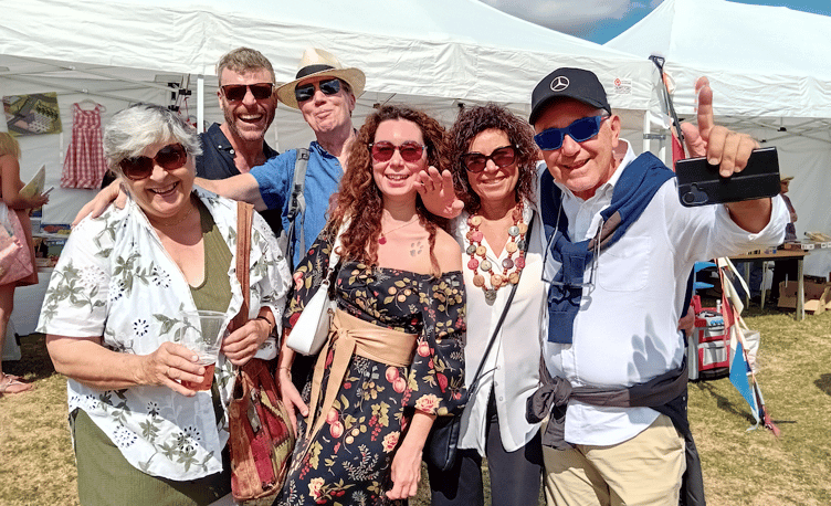 Fitzhead Fete fete visitors (left to right) Sallyann, Tom, and David Halstead, with Giorgia, Cinzia, and Fulvio Longo, from Italy.