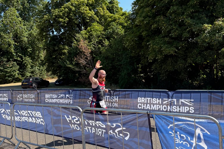 Jamie Mansfield crossing the line