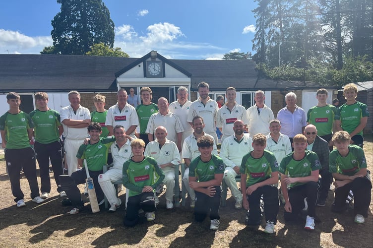 The president's XI and the under-19s line up for a photo