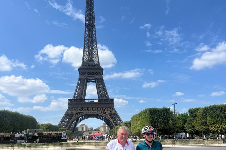 Geoff and Henry Robins at the finish line by the Eiffel Tower