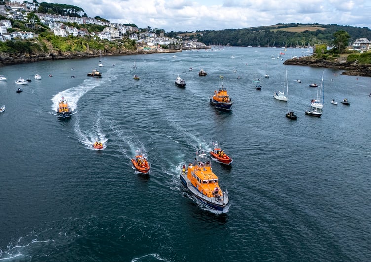 People watched from the shores as the flotilla headed out towards the sea. (Picture: Paul Williams)