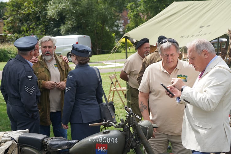 Farnham Town Mayor discussing bikes at VJ Day Fete