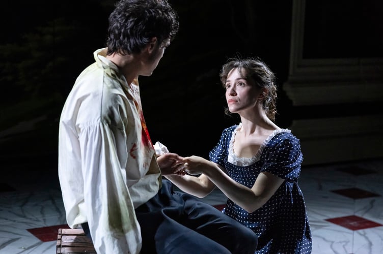 Elizabeth Darcy (Jamie-Rose Duke) visits a wounded George Wickham (Sam Woodhams) as suspicion and old resentments resurface