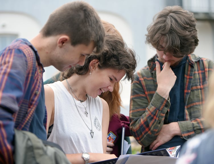 Martha and friends open their A-Level results at Truro School 