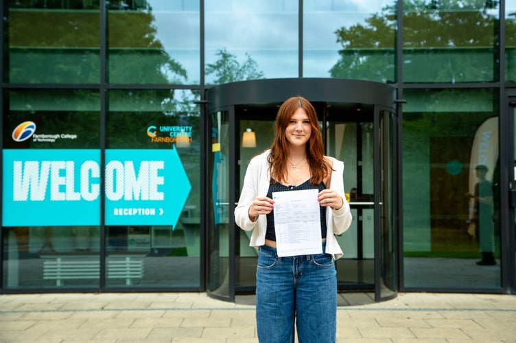 Farnborough College of Technology student Chloe shows off her BTEC uniformed protective services result, August 14th 2025.