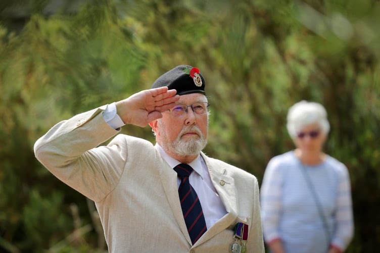 Taking the salute at the service of commemoration organised in the Memorial Garden, Penlee Park, Penzance