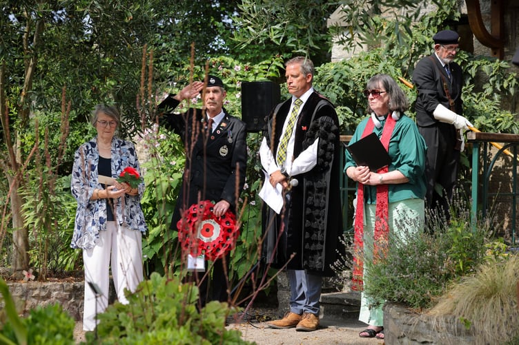Reader Mary Jane Willows, veteran Robert Bolitho, town clerk James Hardy and Rev Derath Durkin at the VJ Day service of commemoration organised in the Memorial Garden, Penlee Park, Penzance