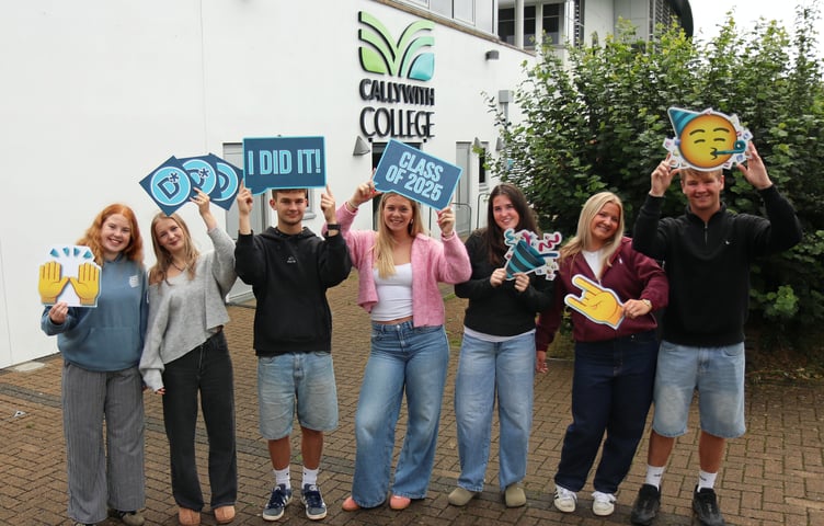 Students celebrating their excellent results after studying at Callywith College (Picture: Callywith College)