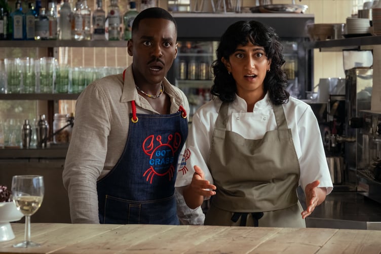 Sunita Mani and Ncuti Gatwa in THE ROSES filmed at The Winking Prawn