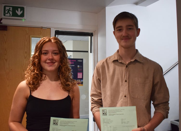 A pair of students smile for the camera after opening their GCSE results (Picture: Callington Community College)