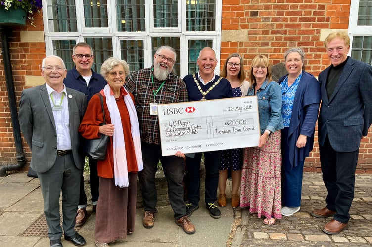 Mayor of Farnham Cllr George Murray, centre, with other councillors and representatives from 40 Degreez, Hale Community Centre and Youth Centre, and the Jubilee Hub.