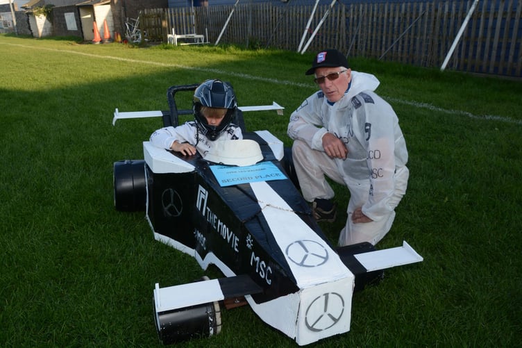 Brad-worthy Pitt brings the speed and glamour in a F1 movie themed entry to the carnival (Picture: Rodney Parrish)