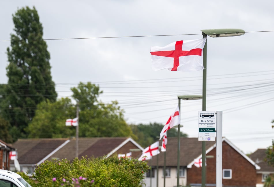 <p>St George flags flying in Stanwell, Surrey. </p>