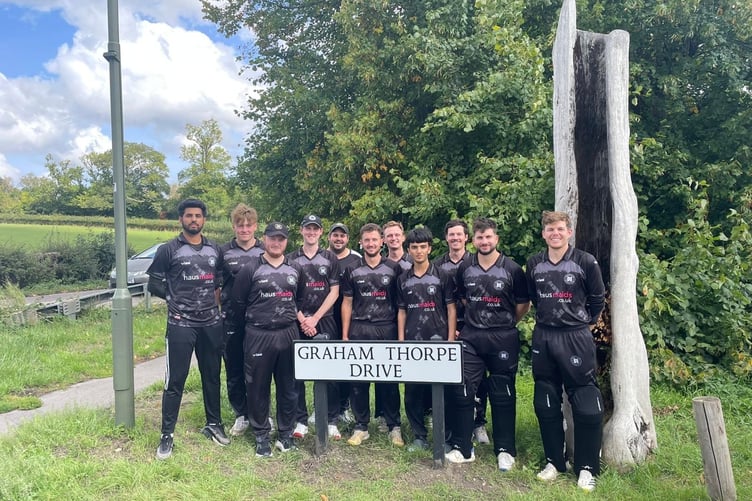 Farnham's first team gather at the recently-renamed Graham Thorpe Drive