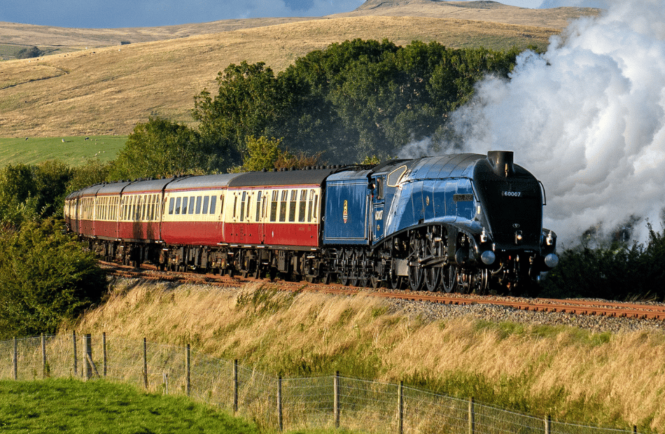 <p>Passengers can enjoy experiences on board the Sir Nigel Gresley when it returns to the Watercress Line in October (Photo: Karl Heath). </p>