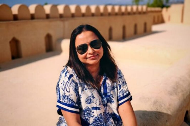 Manju Pillai, 46. // A mum whose legs felt "numb" on her flight back to the UK was later hospitalised with a rare neurological condition. Manju Pillai, 46, first started feeling unwell as she returned home from a family holiday in Qatar and the Maldives with her husband Ajith and their kids Ramaya, 23, and Ashaan, 13. She says her legs felt "numb" and "unusually heavy" on the flight back - but she tried to put her symptoms to the back of her mind as she did not want to miss her daughter's graduation celebrations. However, just over a week later, Manjus legs suddenly "stopped working" while she was walking her dog.