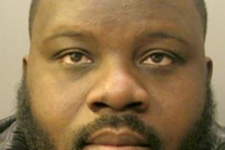 George Melseaux.  // Members of a 'cruel' romance fraud gang who duped a hundred victims from across the world into sending nearly £2m have been jailed.  Five criminals were found to have perpetrated a complex fraud by meeting victims on dating apps under fake identities before tricking them into sending large quantities of money. Impact statements from some victims highlighted the distress and devastation the fraud had caused, with some saying they'd lost their homes. Others said they felt 'ashamed' at having been scammed, saying it had 'ruined' their lives and that they still hadn't told their families. Five members of the fraud gang - Kwabena Edusei, George Melseaux, Fawaz Ali, Michael Quartey and Ebenezer Tackie - were handed prison sentences for their involvement in the fraud, following a six-week trial at Guildford Crown Court earlier this year. The court heard that the wider organised crime group is believed to have used at least seven false identities to defraud a total of 99 victims, who lost a total amounting to £1.8m.  A total of £2.37m was laundered by Edusei, Melseaux, Ali, Quartey and Tackie from the proceeds of this romance fraud and other fraud offences. 