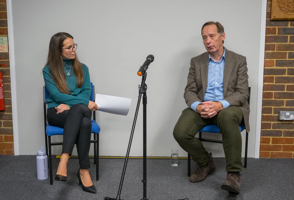 <p>Retired Brigadier Gerhard Wheeler in conversation with Lib-Dem campaigner Theresa Meredith Hardy in Liphook.</p>